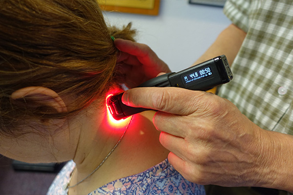 Cold laser therapy at CK Chiropractic Office