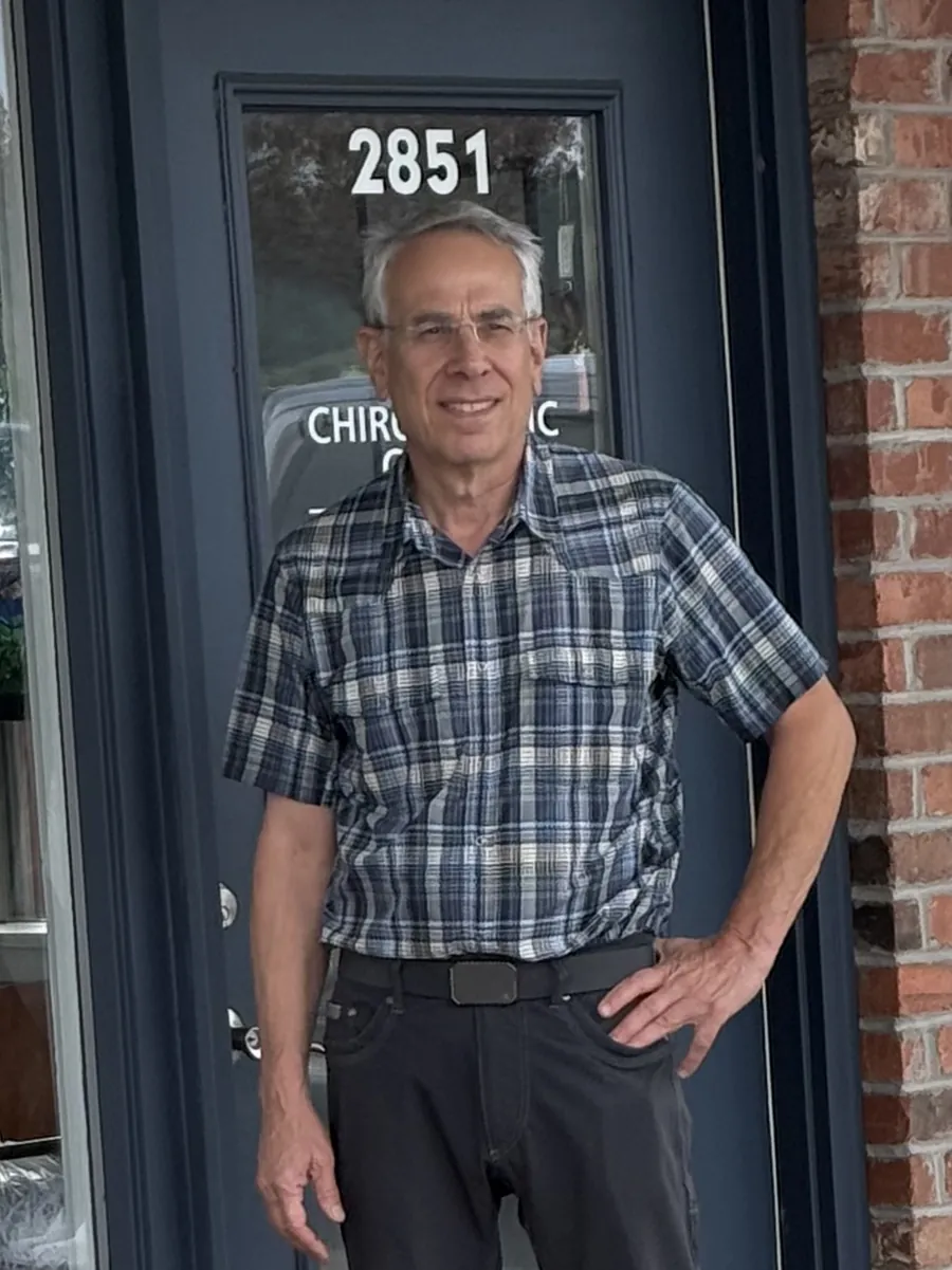 Dr. Scott J. Siegel at the entrance of CK Chiropractic Office in Silverdale, WA