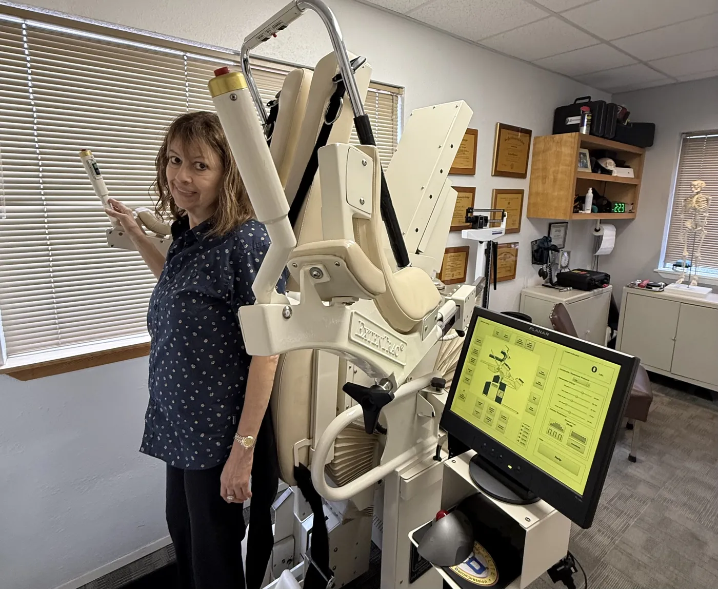 The Extentrac Elite spinal decompression system with its treatment console at CK Chiropractic Office in Silverdale, WA
